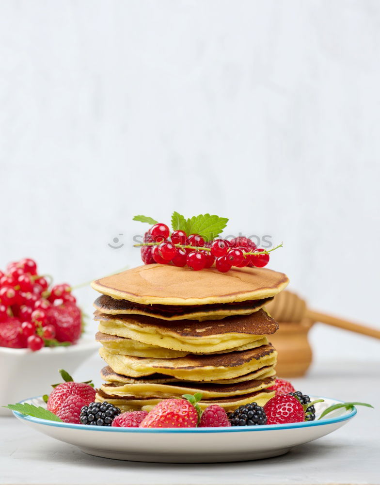 Similar – Image, Stock Photo Pancakes with raspberries and blueberries on white