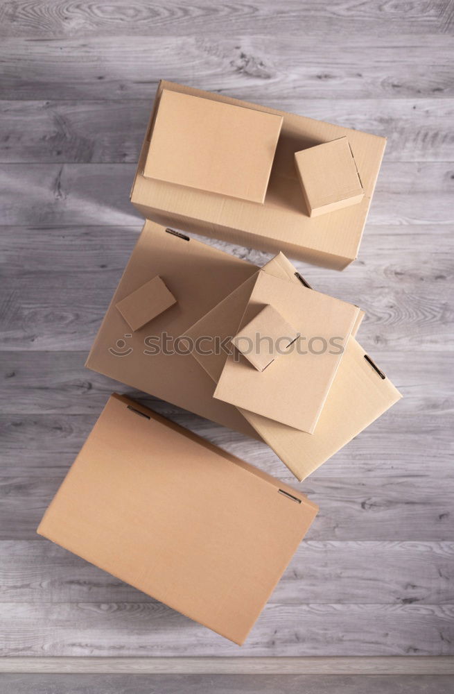 Similar – Image, Stock Photo empty cardboard packages from shipping from an online shop