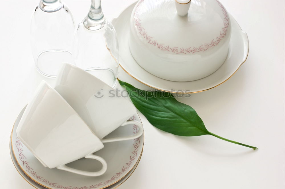 Similar – Crockery arrangement with flower