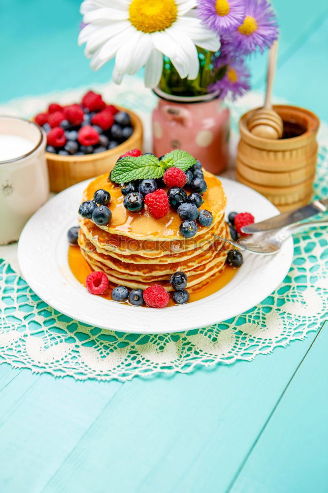 Similar – Image, Stock Photo Pancakes with raspberries and blueberries