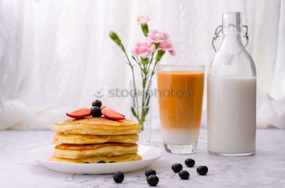 Similar – Image, Stock Photo Pancakes with raspberries and blueberries on white