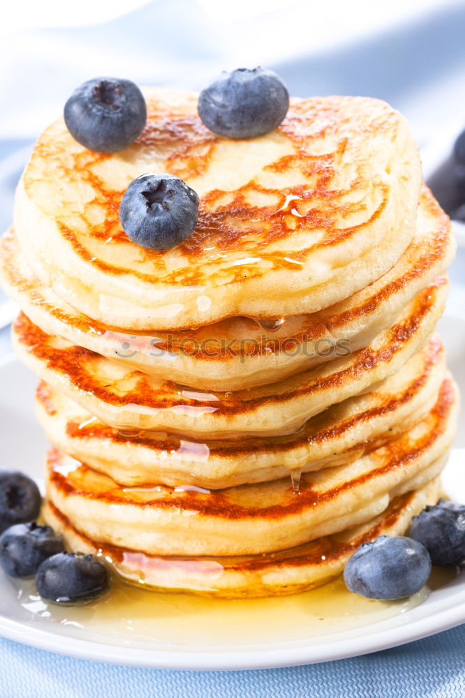 Pancakes with raspberries and blueberries