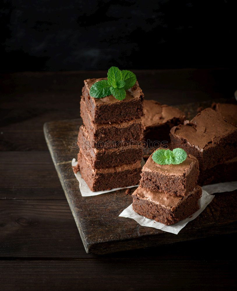 Image, Stock Photo stack of square pieces of baked brown brownie pie