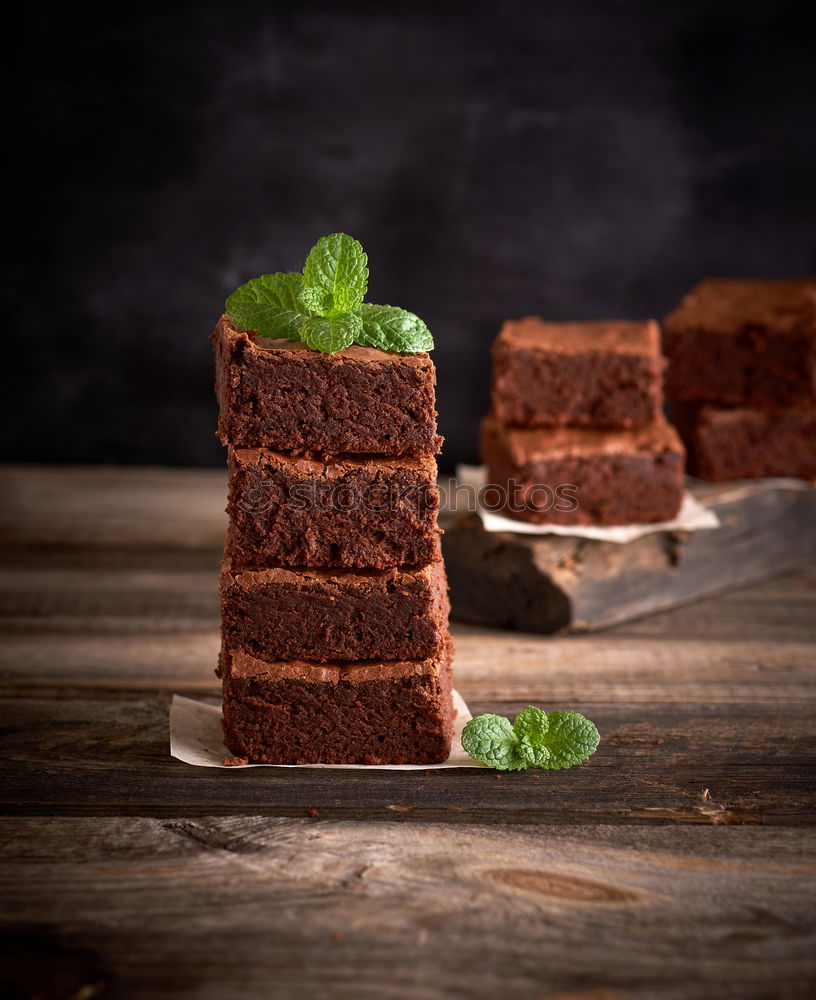 Similar – Image, Stock Photo stack of square pieces of baked brown brownie pie