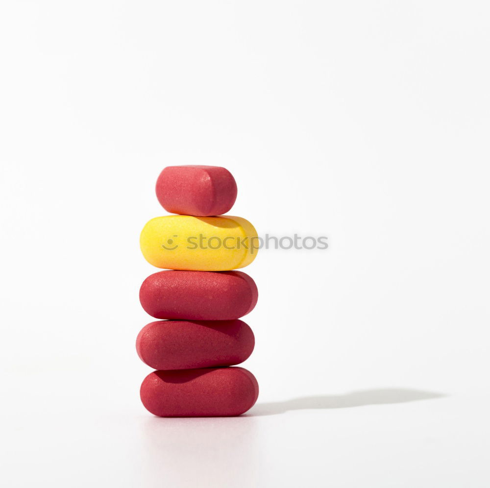 Similar – Image, Stock Photo Two capsule-shaped red and white pills made of paper