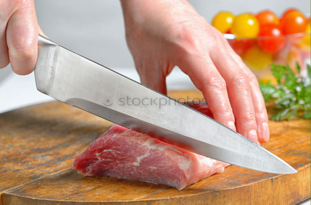 Similar – Image, Stock Photo Cutter carving slices from a whole bone-in serrano ham