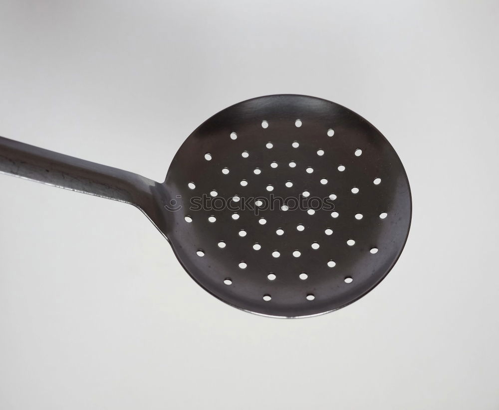 Similar – Image, Stock Photo To the point! A plate with a blue rim, on it many green and a blue ball, dots and a fork on a wooden table