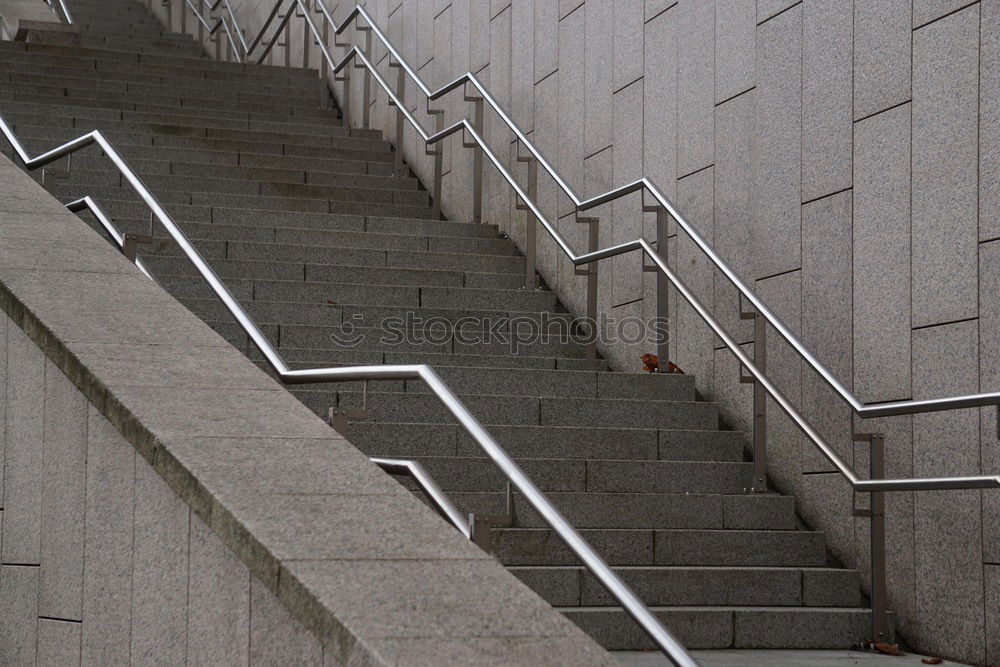 Similar – Trendy girl posing on stairs