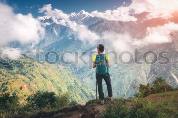 Similar – Image, Stock Photo Young woman on long-distance hiking trail