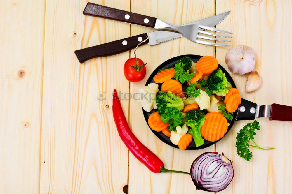 Similar – Image, Stock Photo vegetables in a black round frying pan