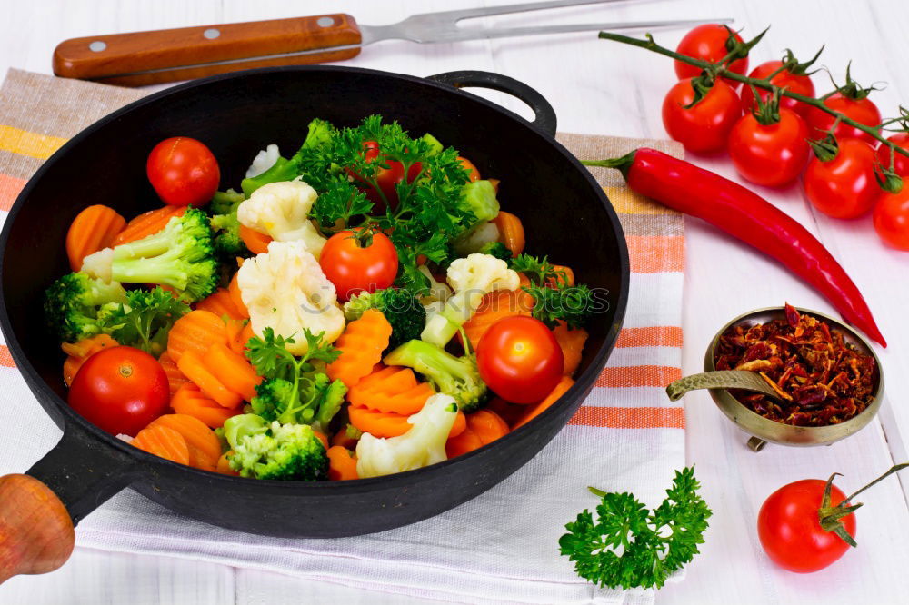 Similar – Image, Stock Photo vegetables in a black round frying pan