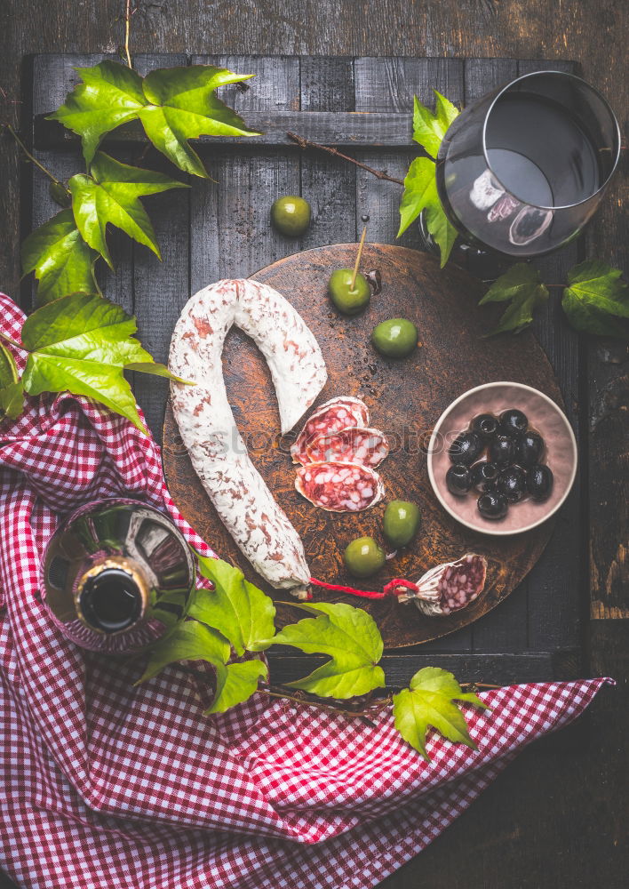 mulled wine and ingredients in iron spoons