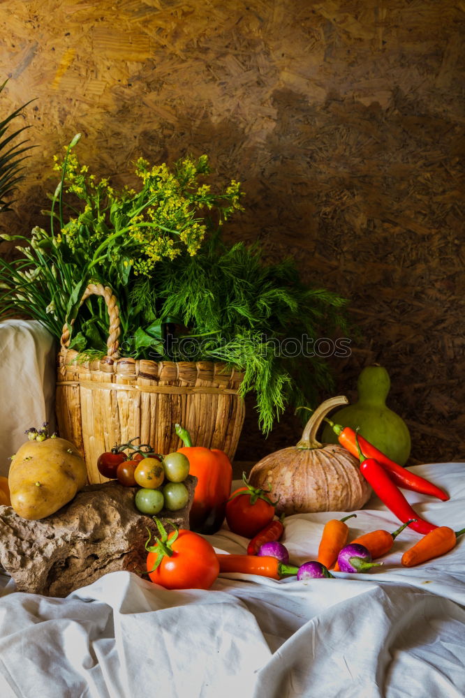 Similar – Image, Stock Photo Colorful tomatoes on the kitchen table with basil