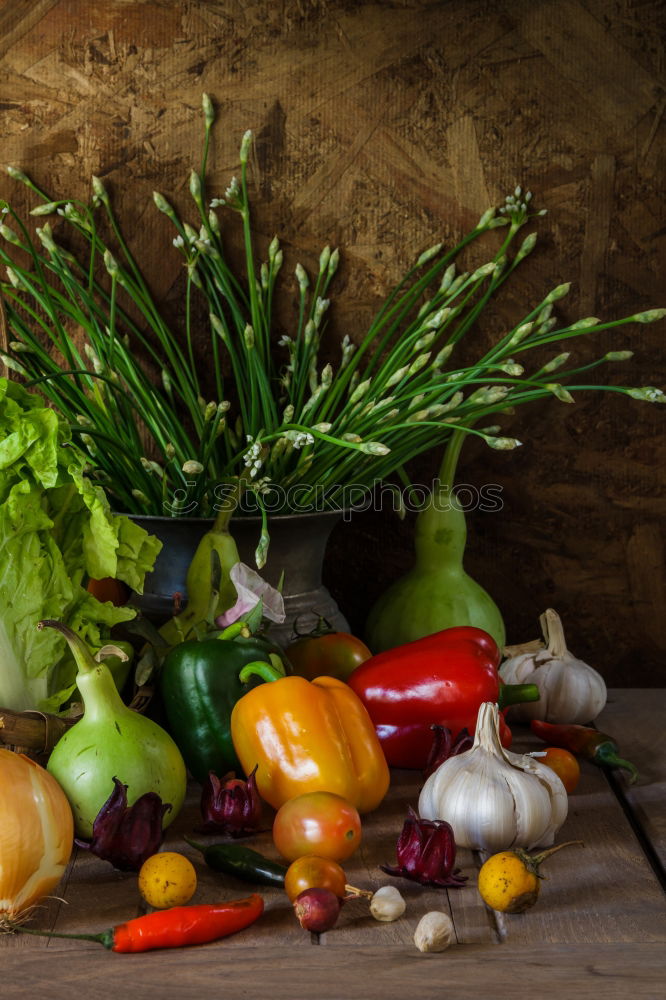 Similar – Vegetables and utensils on kitchen table