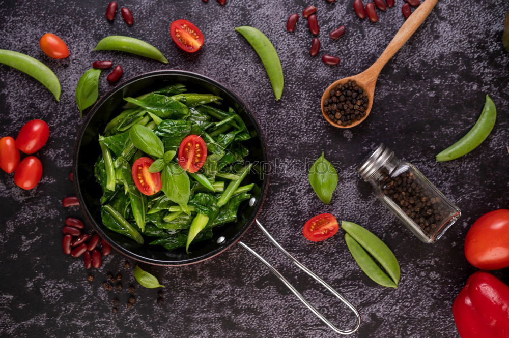 Similar – Image, Stock Photo Empty wok pan on kitchen table with chopsticks and vegetarian Asian food ingredients, top view. Copy space.  Healthy eating and cooking