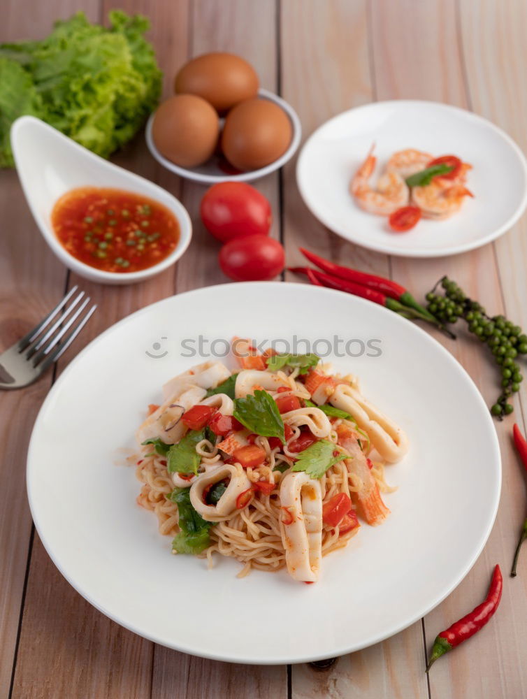 Similar – Plate of penne pasta with arrabiata sauce