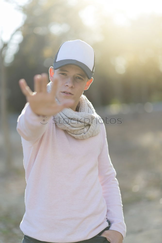 Similar – Refusal | Stop !! No !! Stop !! | boy shows stop hand by stretching out his hand in front of him