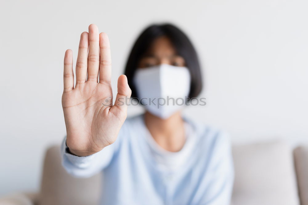 Similar – Image, Stock Photo Woman with face mask and gloves stops the Corona Virus epidemic