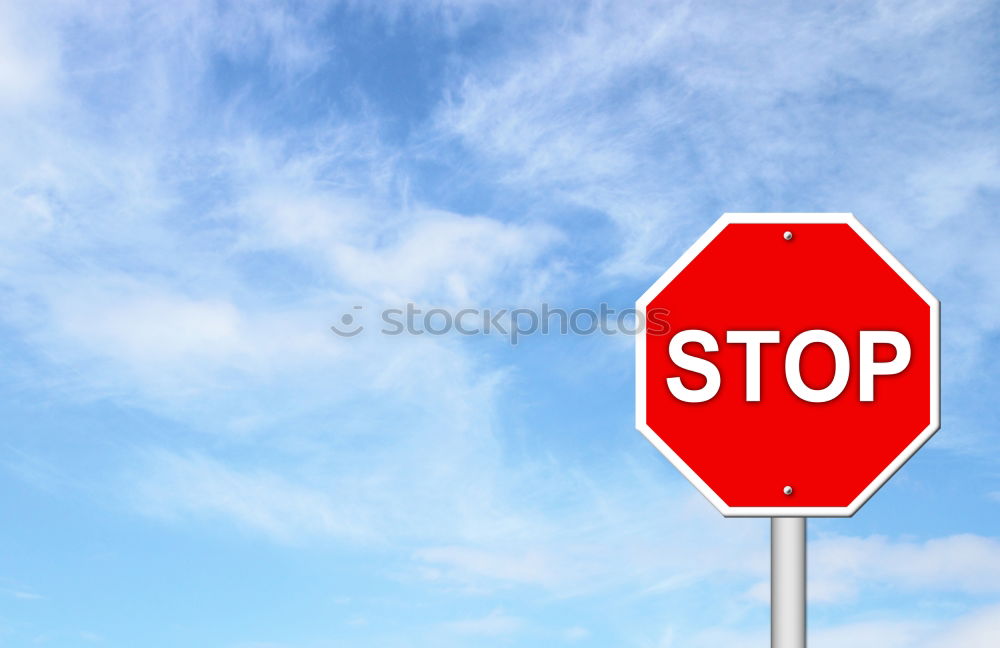 Similar – Signs I Traffic sign stop and prescribed driving direction to the right in front of a blue sky with clouds from the frog perspective / VZ 206 and VZ 209-20