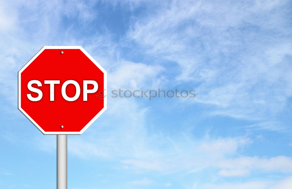 Similar – Signs I Traffic sign stop and prescribed driving direction to the right in front of a blue sky with clouds from the frog perspective / VZ 206 and VZ 209-20