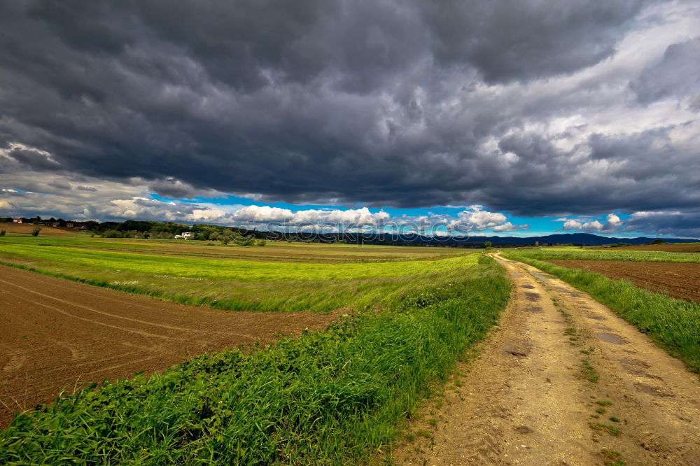 Similar – Field path and landscape