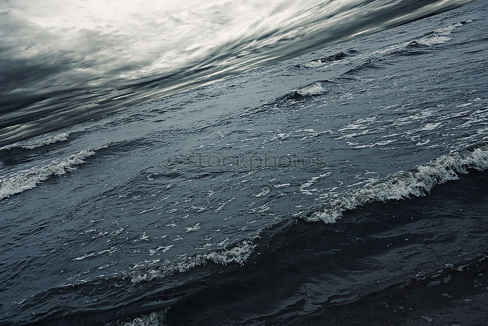 Similar – Image, Stock Photo A lot of sea and a very strong surf on the rocks.