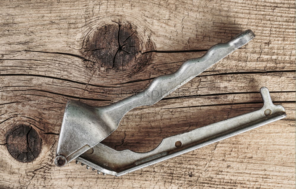 Similar – Grill pan and wooden kitchenware on a brown wooden surface