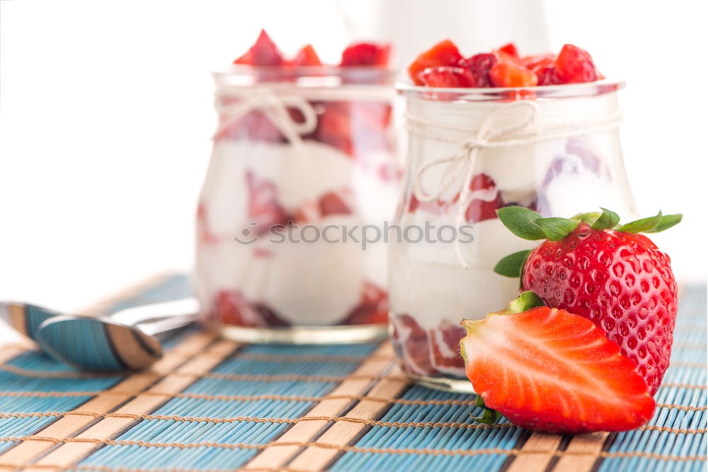 Chia yogurt with raspberries in a glass cup