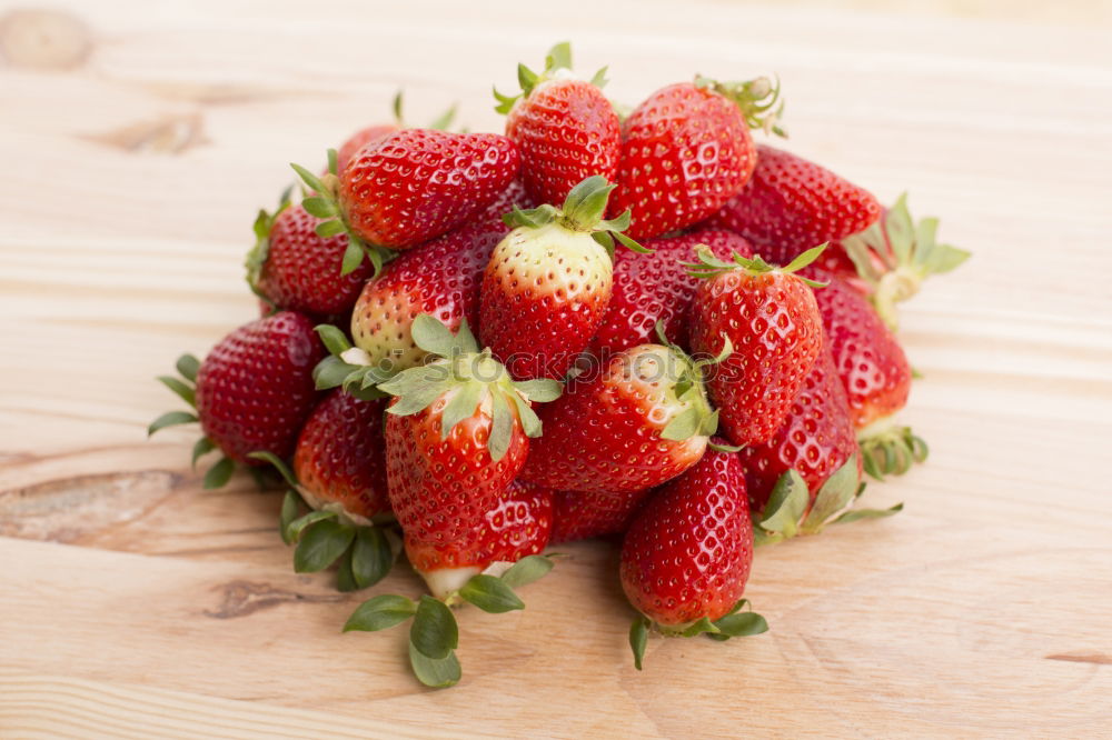 Similar – Strawberries on a wooden board with empty space