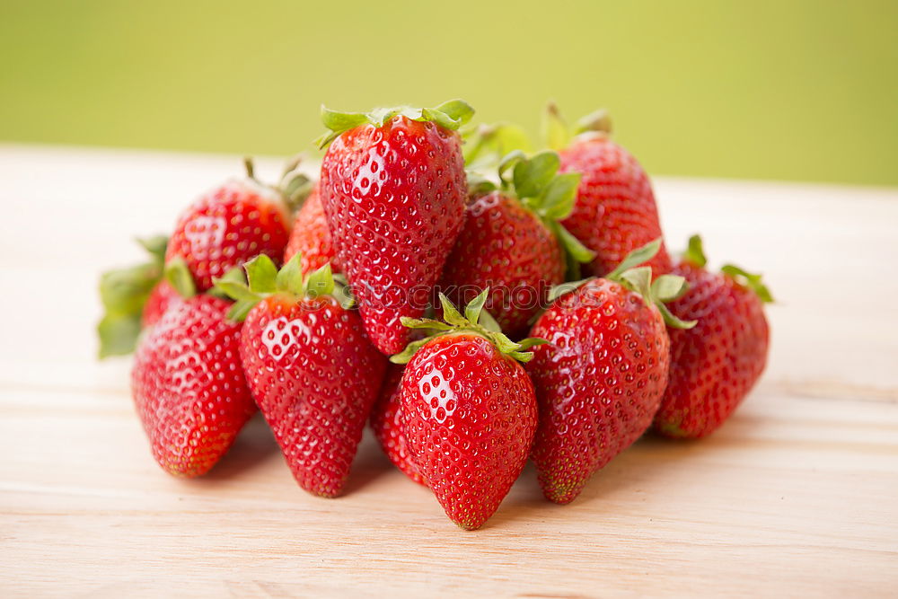 Similar – Strawberries on a wooden board with empty space