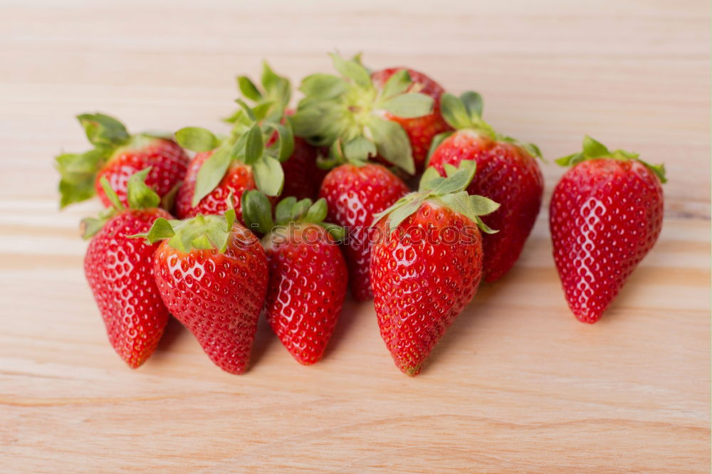 Similar – Bunch of red wild strawberry