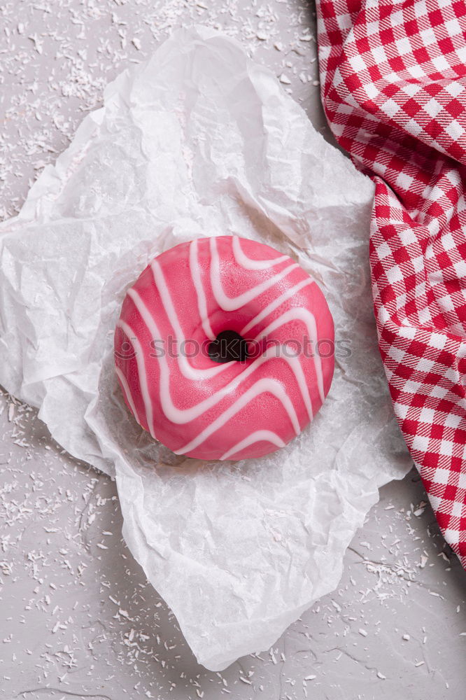 Similar – Image, Stock Photo Top view of pink donut on white and pink background