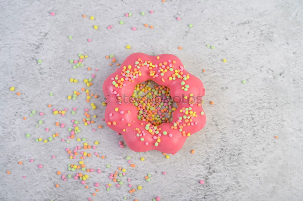 Similar – Half donut with colorful decoration