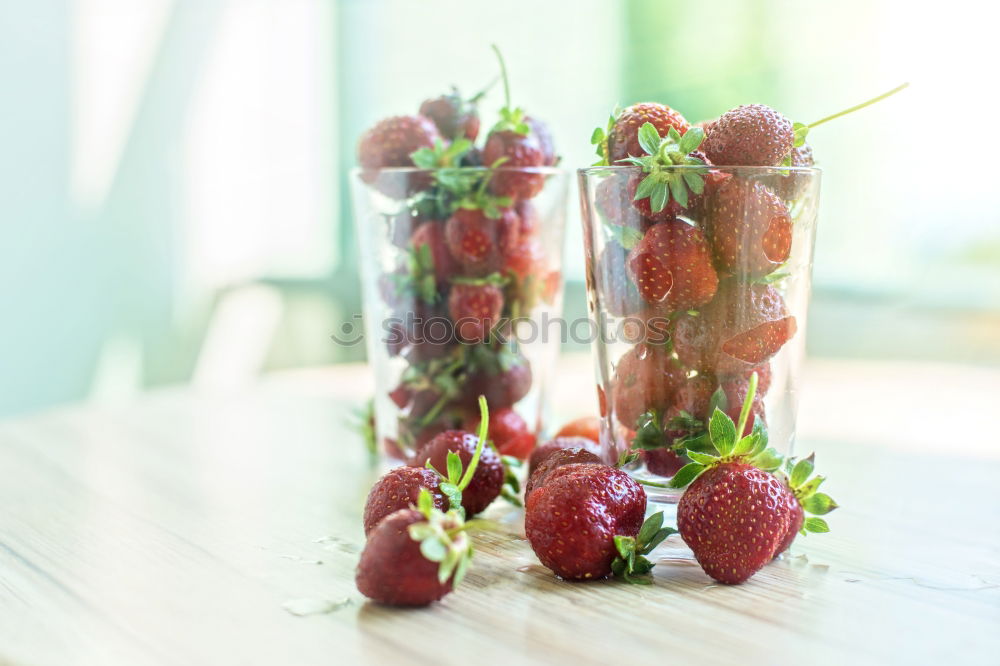 Similar – Image, Stock Photo Ice cubes and berries in bowl on the garden table