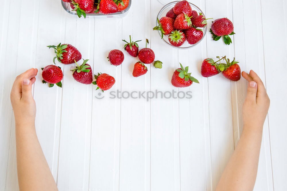 Similar – Strawberries in a bowl on a white wooden table