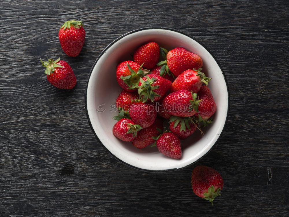 Similar – Fresh yogurt with fruits and muesli on breakfast