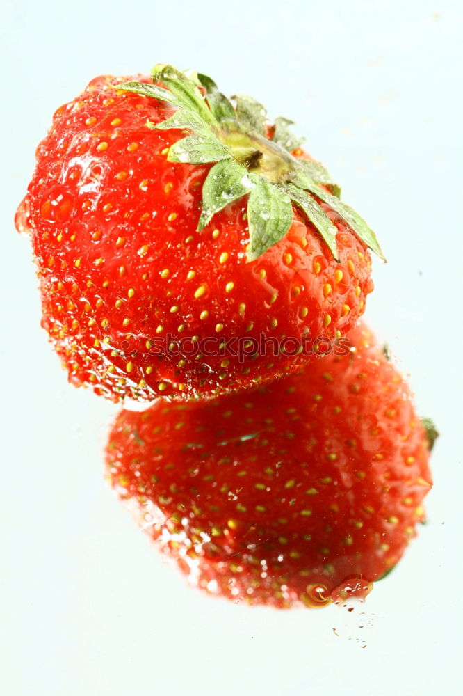 Similar – 3 Erdbeeren rot grün Stil