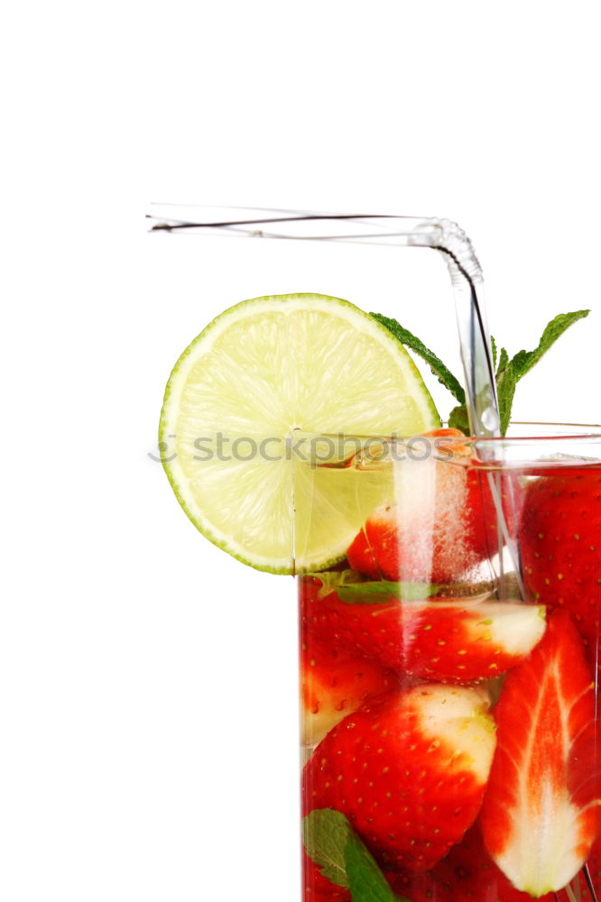 Similar – A glass of cool delicious soft drink with strawberry and currant on white background