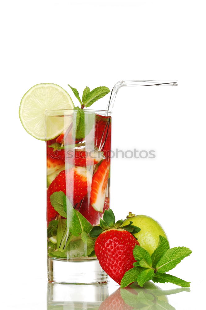 Similar – A glass of cool delicious soft drink with strawberry and currant on white background