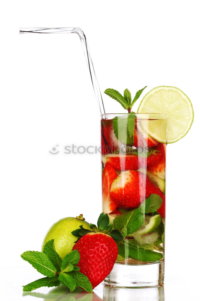 Similar – A glass of cool delicious soft drink with strawberry and currant on white background