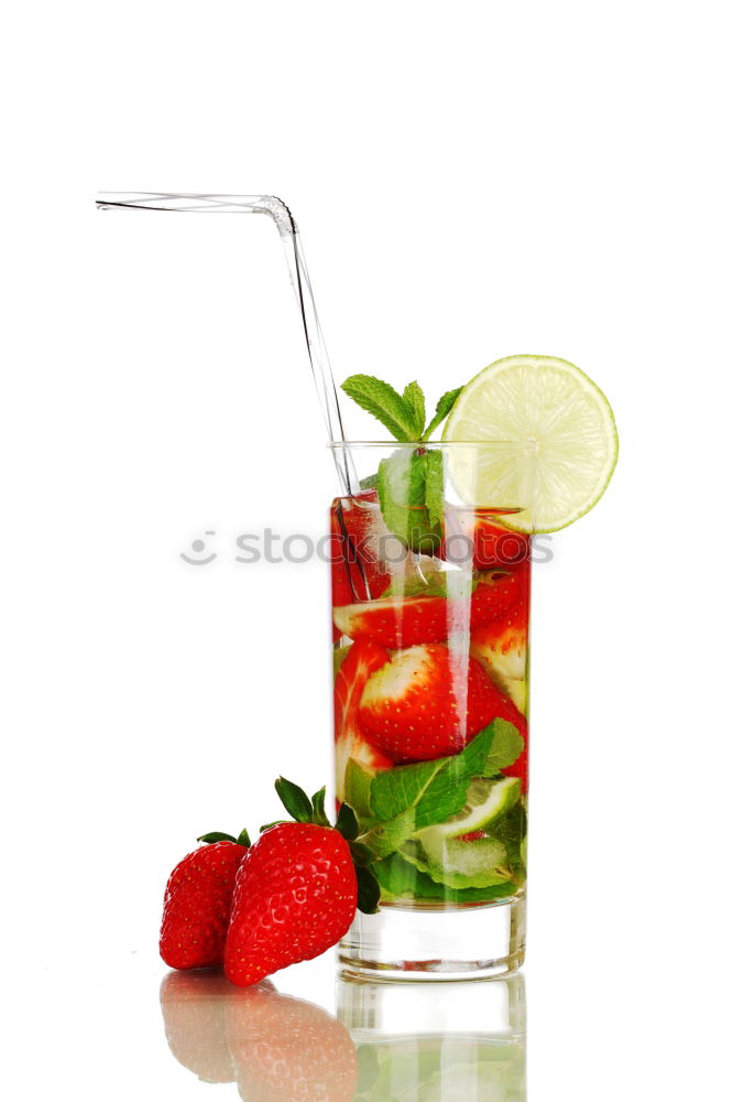 Similar – A glass of cool delicious soft drink with strawberry and currant on white background