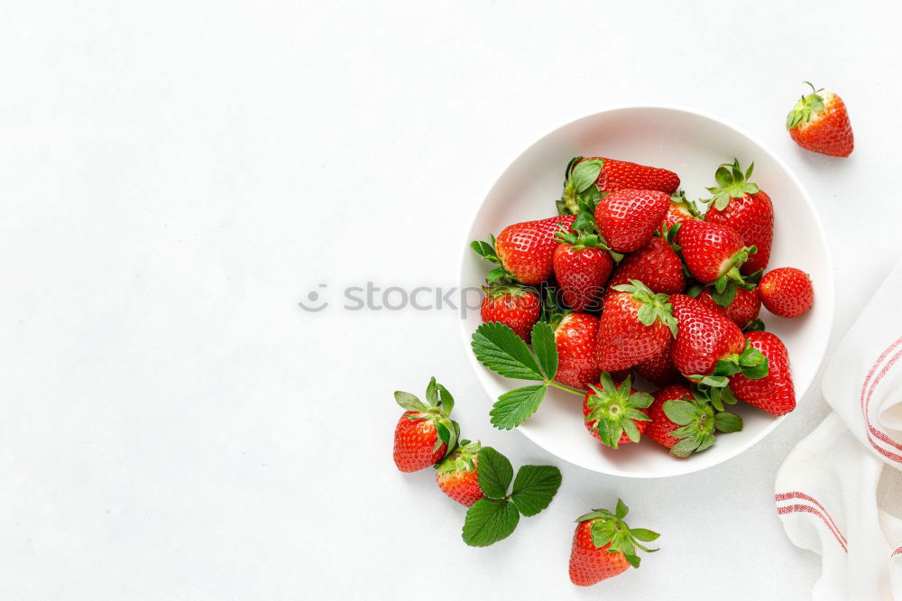 Similar – Strawberries in a bucket on a white wooden table