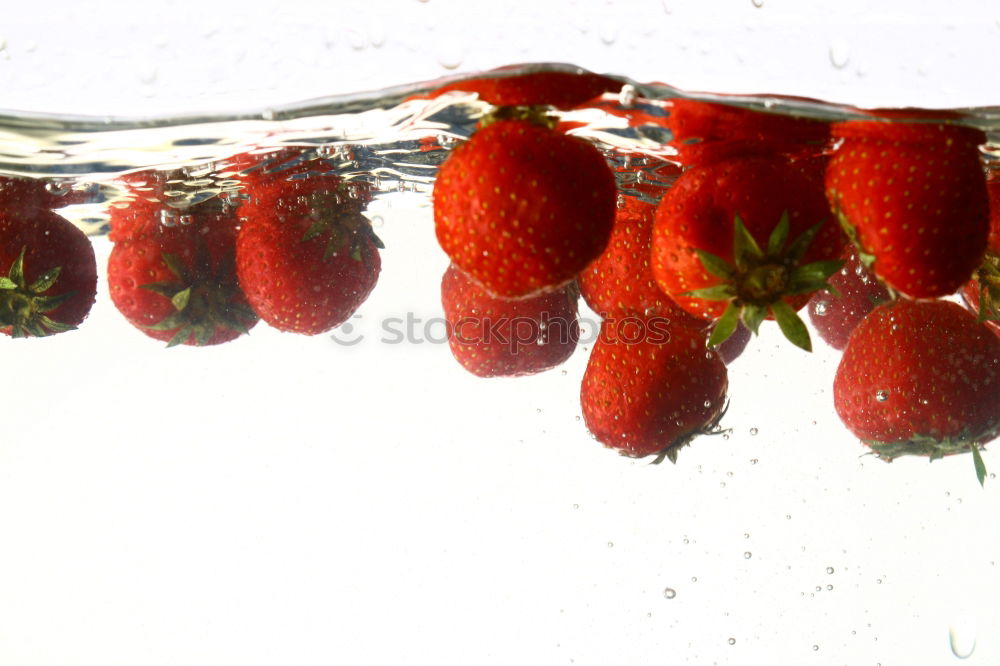 Similar – 3 Erdbeeren rot grün Stil