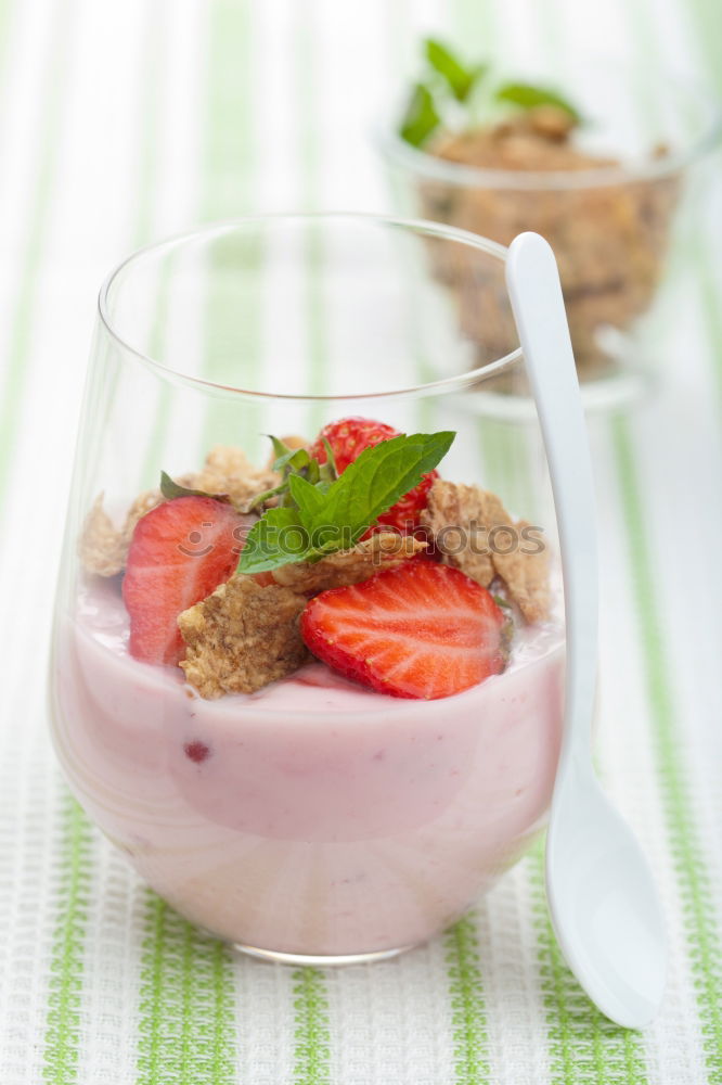 Similar – Yogurt with cereals and strawberries