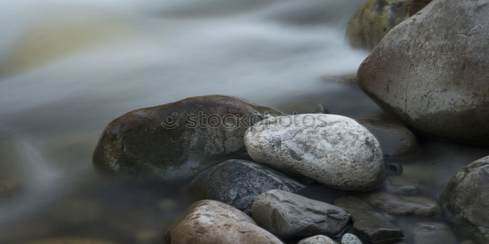 Similar – Stones on the Rhine Gravel