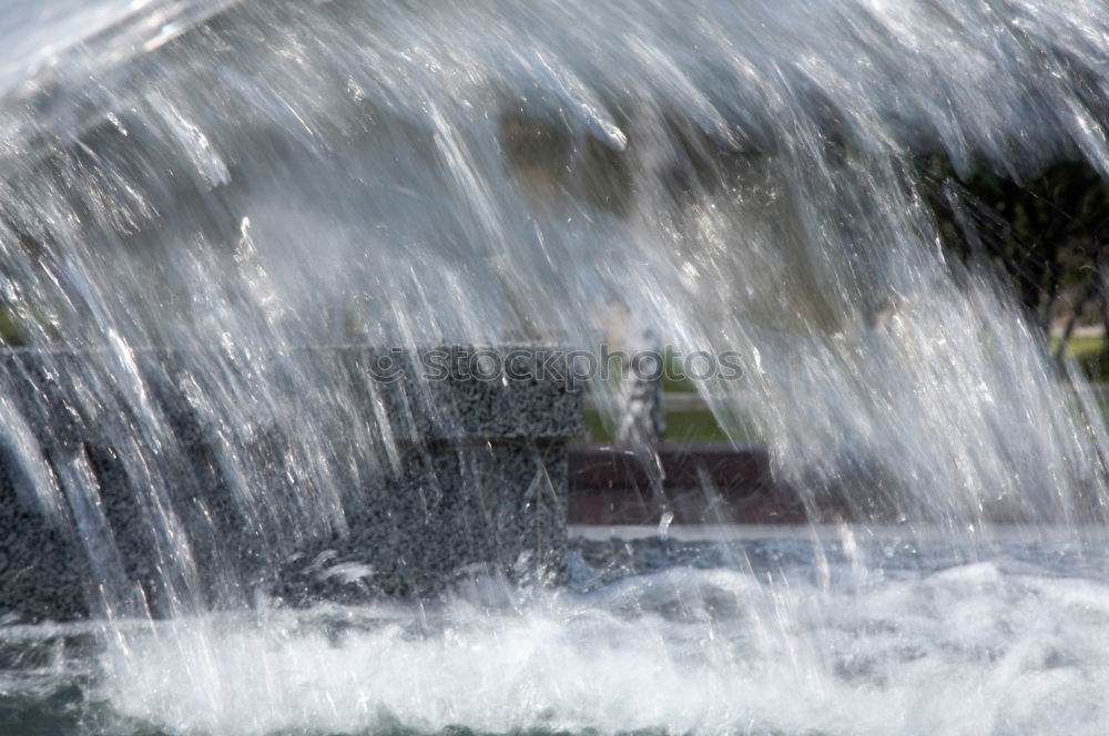 Similar – Wasserspiel Wassertropfen