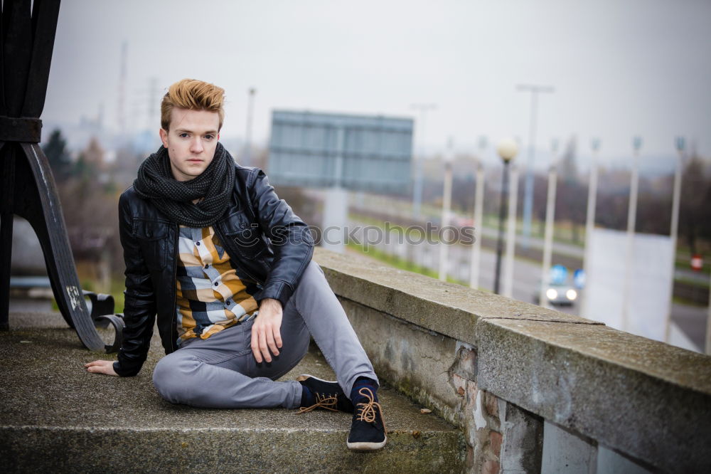 Cheerful man standing at train