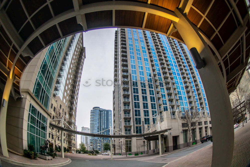 Man climbing the stairs to the skyscraper