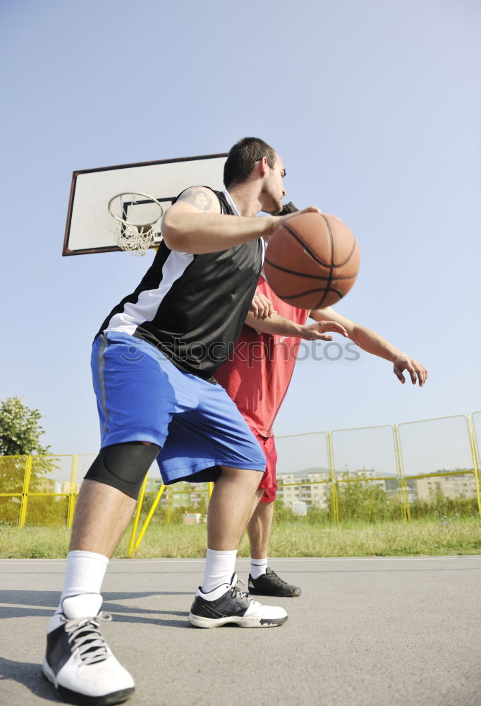 Similar – Image, Stock Photo Female basketball player stretching on sports ground