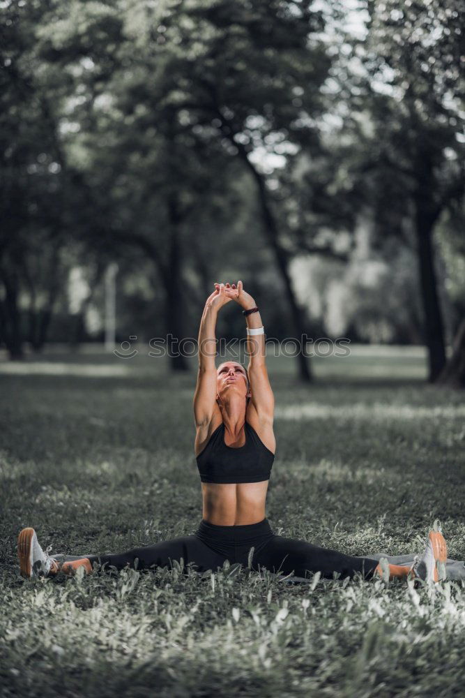 Similar – young woman doing yoga exercise outdoor